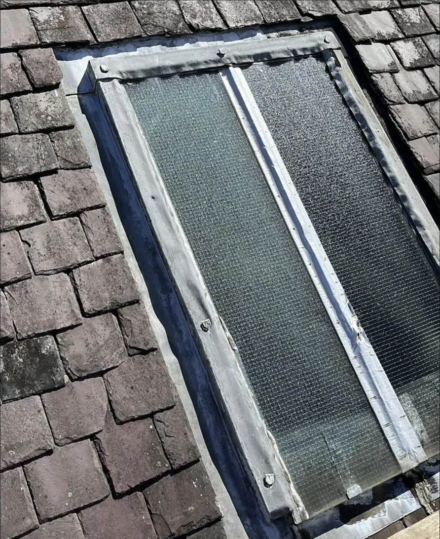A traditional leaded skylight set into old weathered Scottish slate